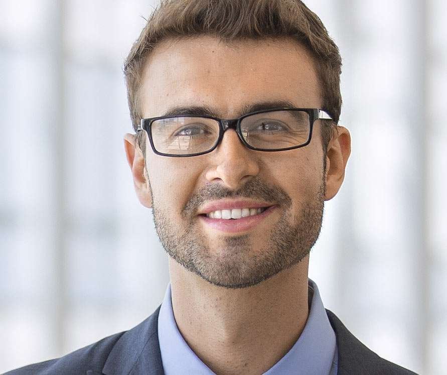Man in suit with glasses