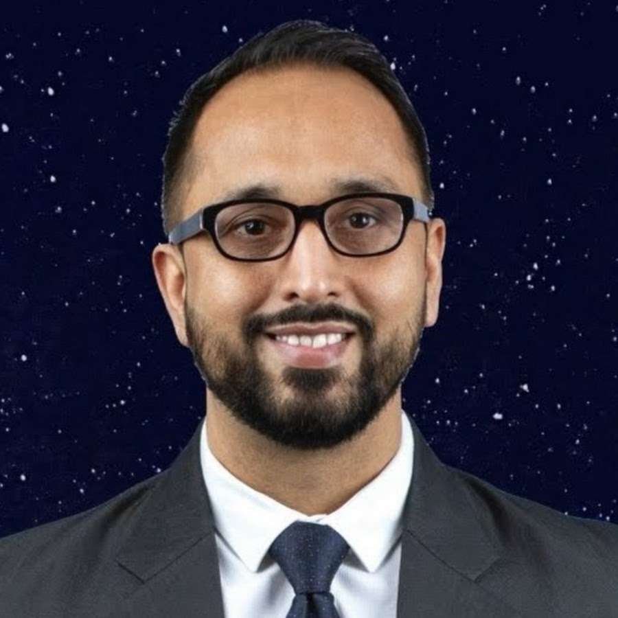 Man in suit with glasses